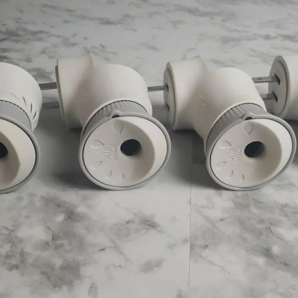 5 Preowned Airwick Plug Diffusers‎